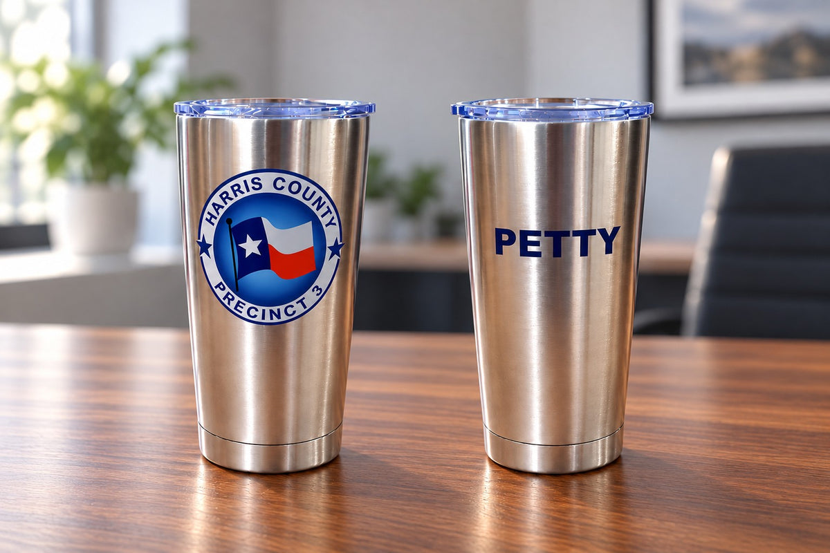 Two 20 oz custom UV printed stainless steel tumblers showing a color logo and personalized name