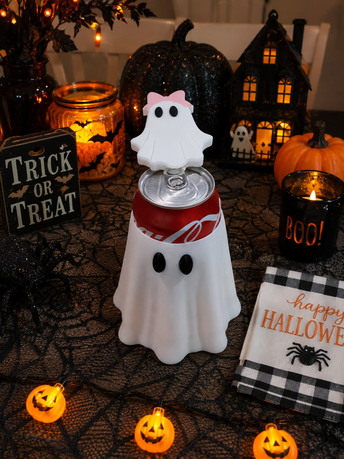 Ghost with pink bow 3D printed nail saver on a soda can